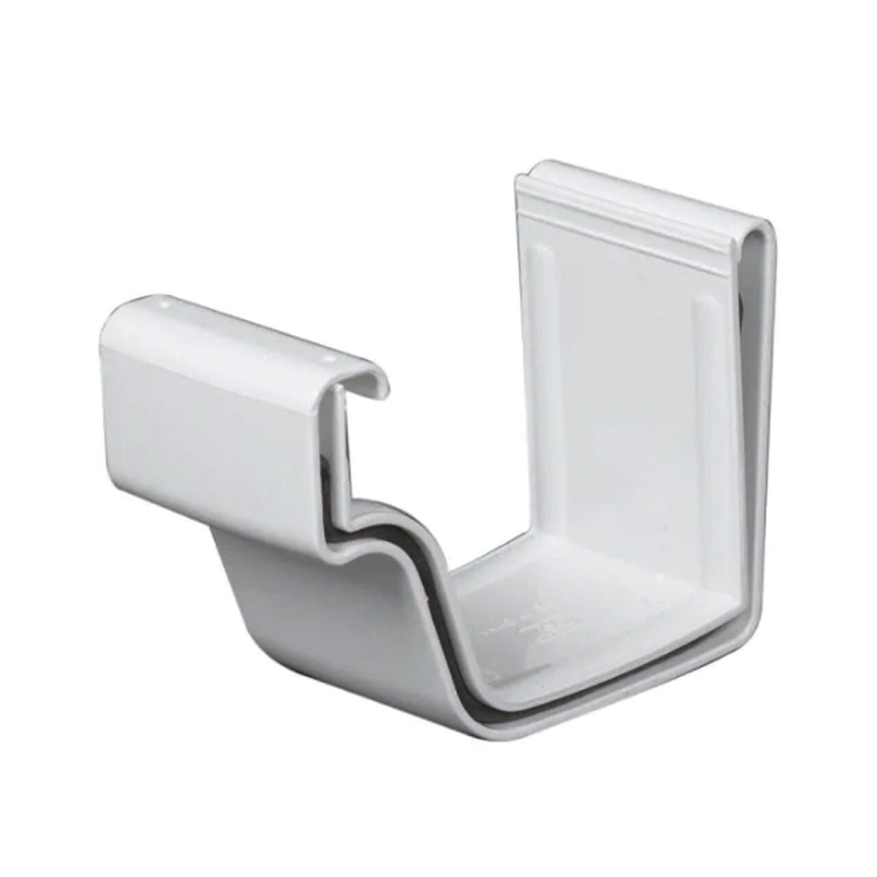 A white, plastic, L-shaped cable clip with a curved inner edge and open top, inspired by the Go Build 5 in. Vinyl K-Style Joiner - White, secures cables or cords to surfaces.